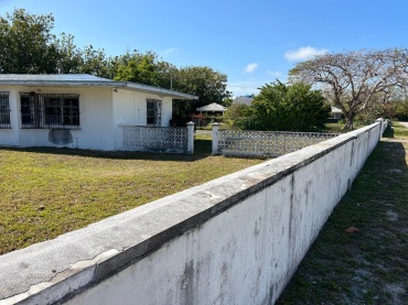 HOUSE ON LOT NUMBER 26, SEA GRAPE LANE OFF ROYAL PALM WAY IN THE LUCAYAN BEACH SUBDIVISION
