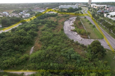 DOWNTOWN CENTRAL ON THE MALL, FREEPORT-6 ACRES OF PRIME COMMERCIAL PROPERTY FOR SALE. EXCELLENT FOR YOUR VERY OWN SHOPPING MALL.