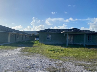FOURPLEX ON PINTA AVENUE SOUTH BAHAMIA-TWO ACRES OF PROPERTY.